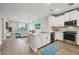 Modern kitchen with white cabinets, stainless steel appliances, and an island at 7517 Laureate Blvd # 4205, Orlando, FL 32827