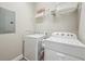 Laundry room with washer and dryer hookups at 7517 Laureate Blvd # 4205, Orlando, FL 32827