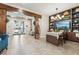 Lobby with seating area, a table and modern design at 7517 Laureate Blvd # 4205, Orlando, FL 32827