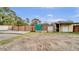 Backyard with shed, fence, and open area at 833 N County Road 13, Orlando, FL 32820