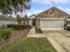 One-story home with stone accents and a two-car garage at 9143 Sw 65Th Loop, Ocala, FL 34481