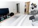 Comfortable bedroom with a large bed and access to a private bathroom at 975 Benjamin Trl, Davenport, FL 33837