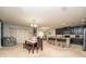 Open concept kitchen and dining area at 975 Benjamin Trl, Davenport, FL 33837
