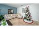 Spacious living room with sectional sofa and decor at 975 Benjamin Trl, Davenport, FL 33837