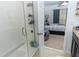 Clean and modern walk-in shower with glass enclosure at 975 Benjamin Trl, Davenport, FL 33837