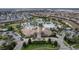 Community clubhouse and pool area with ample parking at 1550 Observer Ln, Davenport, FL 33896