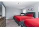 Bedroom with three twin beds, great for guests at 1550 Observer Ln, Davenport, FL 33896