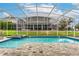 Relaxing pool and spa with a covered patio area at 1550 Observer Ln, Davenport, FL 33896