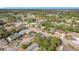 Wide aerial view showing the property and surrounding neighborhood at 1733 Hickorywood Ln, Orlando, FL 32818