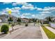 Gated community entrance with luxury homes at 2205 Lake Sylvan Oaks Ct, Sanford, FL 32771
