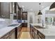 Sleek kitchen with marble countertops, stainless steel appliances, and ample storage at 2205 Lake Sylvan Oaks Ct, Sanford, FL 32771
