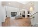 Spacious living area with hardwood floors, open concept floorplan and fireplace at 2205 Lake Sylvan Oaks Ct, Sanford, FL 32771