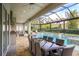 Relaxing pool area with covered patio and dining table at 2205 Lake Sylvan Oaks Ct, Sanford, FL 32771
