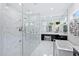 Spa-like Primary bathroom with marble finishes, a large shower, and a freestanding tub at 2205 Lake Sylvan Oaks Ct, Sanford, FL 32771