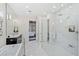 Modern Primary bathroom with walk-in shower, soaking tub and double vanity at 2205 Lake Sylvan Oaks Ct, Sanford, FL 32771