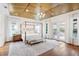 Bright and airy Primary bedroom with hardwood floors and a gorgeous tray ceiling at 2205 Lake Sylvan Oaks Ct, Sanford, FL 32771
