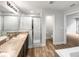 Double vanity bathroom with a shower and separate toilet at 225 Arbuthnot St, Winter Haven, FL 33881