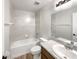 Clean bathroom with tub shower and modern vanity at 225 Arbuthnot St, Winter Haven, FL 33881