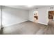 Spacious bedroom with neutral color palette and carpet flooring at 225 Arbuthnot St, Winter Haven, FL 33881