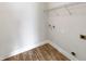 Convenient laundry room with shelving and hookups at 225 Arbuthnot St, Winter Haven, FL 33881