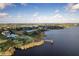 Community lakefront view with walking path and dock at 2806 Balforn Tower Way, Winter Garden, FL 34787