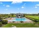 Inviting community pool with surrounding patio at 2806 Balforn Tower Way, Winter Garden, FL 34787