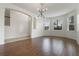Spacious dining room with hardwood floors and an open concept at 2806 Balforn Tower Way, Winter Garden, FL 34787