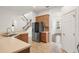 Kitchen with stainless steel appliances and light colored countertops at 2806 Balforn Tower Way, Winter Garden, FL 34787