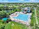 Large resort-style pool with plenty of lounge chairs at 2806 Balforn Tower Way, Winter Garden, FL 34787