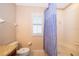 Bright bathroom with granite countertop and shower/tub combo at 3030 Calabria Ave # 436, Davenport, FL 33897