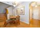 Small dining area with wood table and chairs near entryway at 3030 Calabria Ave # 436, Davenport, FL 33897