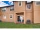 Rear exterior view showing patio and access to the unit at 3030 Calabria Ave # 436, Davenport, FL 33897