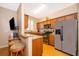 Modern kitchen with granite countertops and stainless steel appliances at 3030 Calabria Ave # 436, Davenport, FL 33897