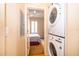 Convenient laundry room with stackable washer and dryer at 3030 Calabria Ave # 436, Davenport, FL 33897