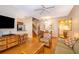 Open concept living area with kitchen and staircase at 3030 Calabria Ave # 436, Davenport, FL 33897