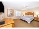 Large main bedroom featuring a king-size bed and lots of light at 3030 Calabria Ave # 436, Davenport, FL 33897