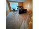 Spacious bedroom with a sleigh bed and window at 4136 Versailles Dr # 4136D, Orlando, FL 32808