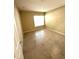 Bright bedroom featuring tile flooring and a window at 4324 S Kirkman Rd # 1, Orlando, FL 32811