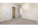 Bedroom with neutral walls, carpet, and a closet at 5482 Hayloft Dr, Apopka, FL 32712