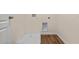 Laundry room with a drain and space for appliances at 5482 Hayloft Dr, Apopka, FL 32712