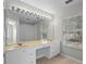 Double vanity bathroom with large mirror and window at 6292 Twain St # 101, Orlando, FL 32835
