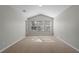 Spacious bedroom with large windows and vaulted ceiling at 6292 Twain St # 101, Orlando, FL 32835