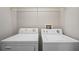 Laundry closet with washer and dryer at 6292 Twain St # 101, Orlando, FL 32835