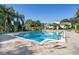 Inviting community pool with surrounding patio at 6292 Twain St # 101, Orlando, FL 32835