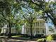 Two-story house with front porch, tree-lined street at 821 Veranda Pl, Celebration, FL 34747