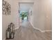 Light-filled entry hall showcasing tile floors and views into the home's interior at 1020 Lakeside Estates Dr, Apopka, FL 32703