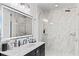 Modern bathroom with marble shower and vanity at 150 E Robinson St # 802, Orlando, FL 32801