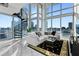 Spacious living area with city views and spiral staircase at 150 E Robinson St # 802, Orlando, FL 32801