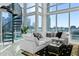 Sunlit living room with floor-to-ceiling windows and city views at 150 E Robinson St # 802, Orlando, FL 32801