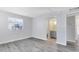 Bright bedroom with grey vinyl flooring and access to the bathroom at 1500 Gay Rd # 7A, Winter Park, FL 32789